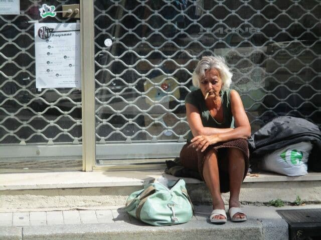 Homeless woman smoking